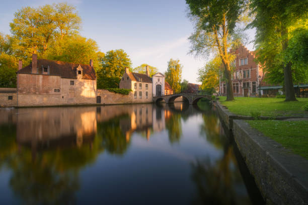 Bruges canals at sunrise. Long exposure shot took at Bruges, the medieval old town of Belgium