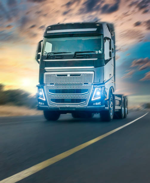 istock Heavy Truck speeding on the highway 1210715914