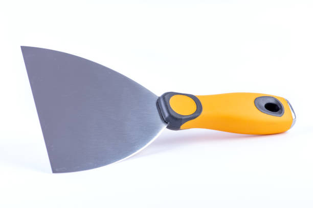 Putty knife tool close-up isolated on white background