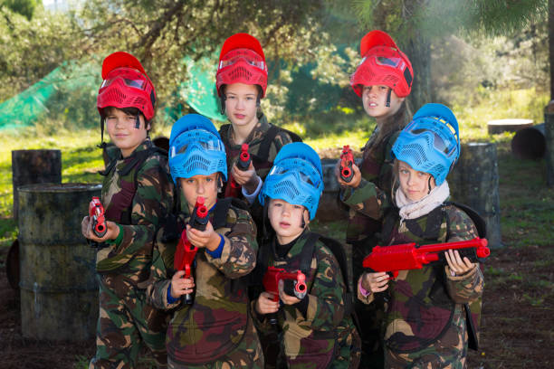 istock Kids ready for paintball game 1210720331