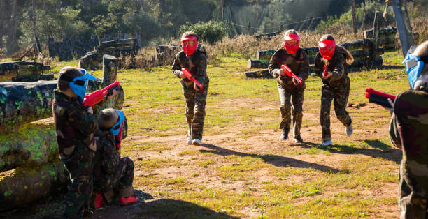 istock Teams of kids facing on battlefield 1210720399
