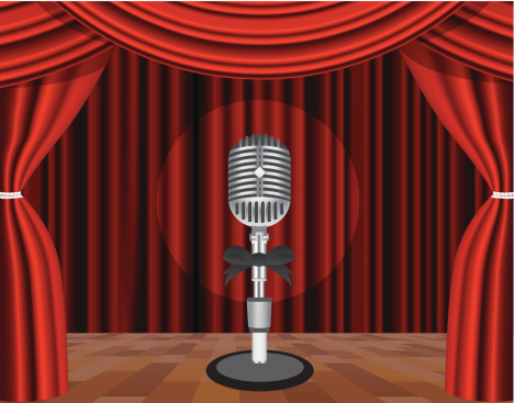 Microphone on a stage with a spotlight on it. Vector illustration. On background - CURTAIN which can be used as a pattern (seamless)