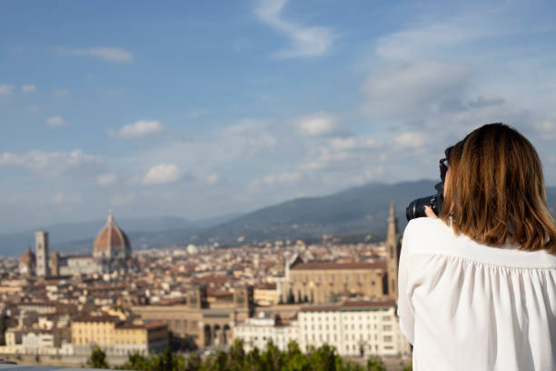 istock Young photographer capturing cityscape 1210723823