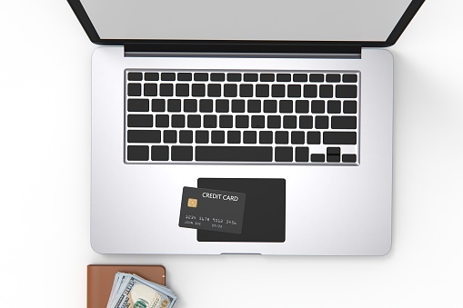 shopping online and paying with a credit card from the wallet. Copy space.