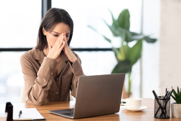 istock European manager sitting at desktop at workplace 1210729265