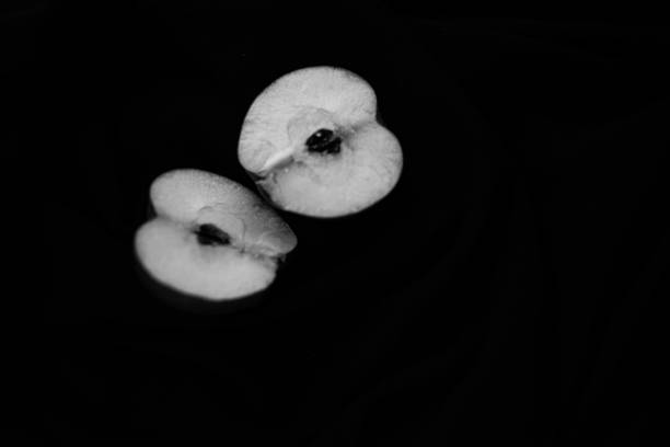 Cut in the middele of apple on black backround