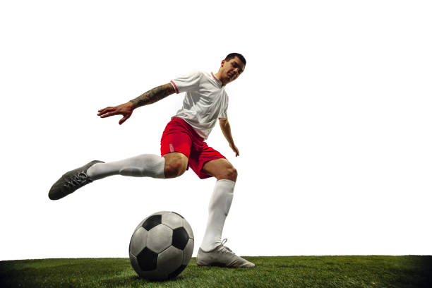 istock Football or soccer player on white background - motion, action, activity concept 1210731186
