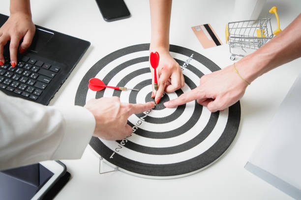 istock Businesspeople point ideas and cooperation a teamwork will goals lead to success. 1210731996