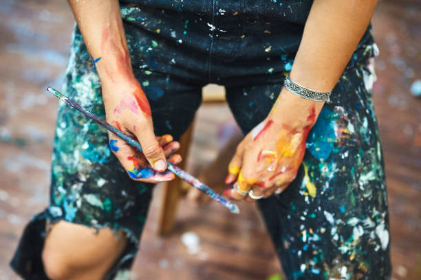istock She doesn't just think the art, she paints it 1210733650