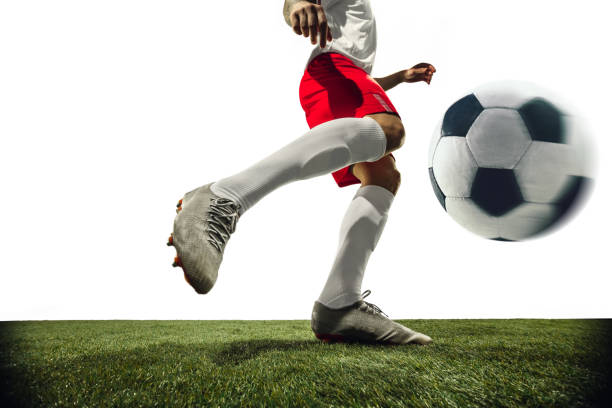 istock Football or soccer player on white background - motion, action, activity concept 1210736928