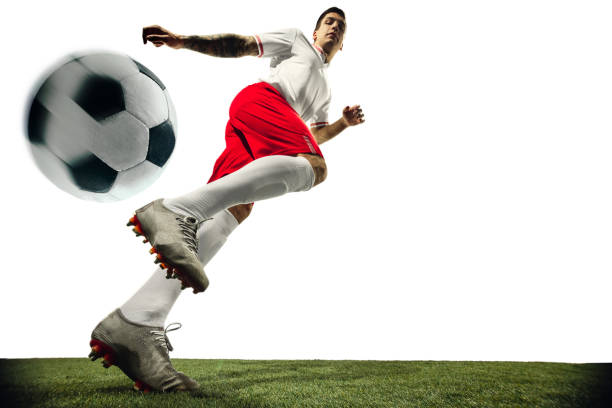 istock Football or soccer player on white background - motion, action, activity concept 1210736942