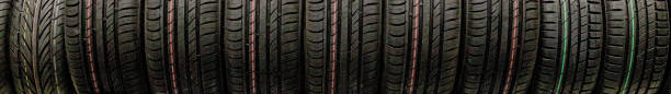 kyiv- jan 6, 2019: car tires and wheels at warehouse in tire store. - 2333 imagens e fotografias de stock