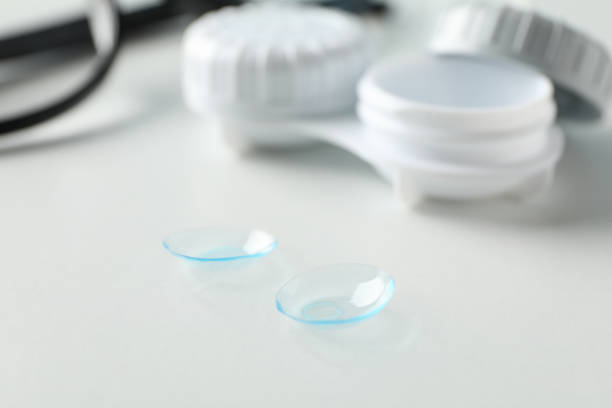 istock Glasses, contact lenses and case on white background, close up 1210739603