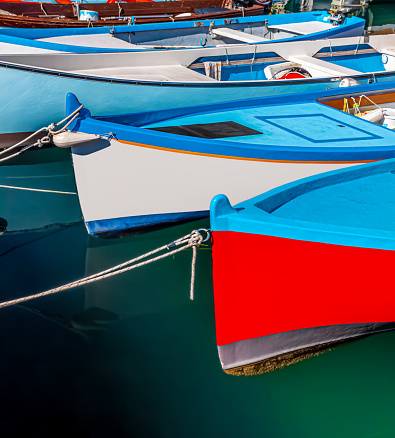 Small group of colourful; mediterranean fishing boats.