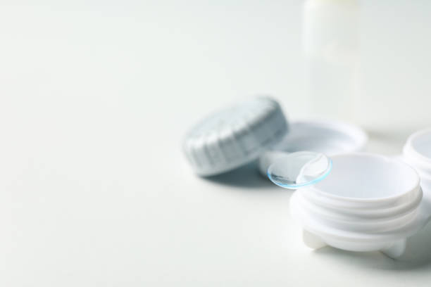 istock Contact lenses and case on white background, close up 1210739984
