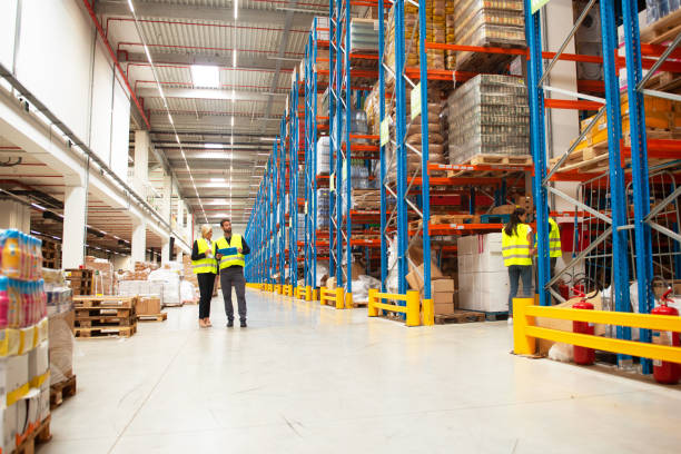 istock Managers checking the list of products 1210740911