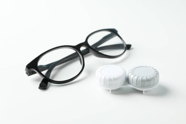 istock Gasses and contct lenses on white background, close up 1210741152