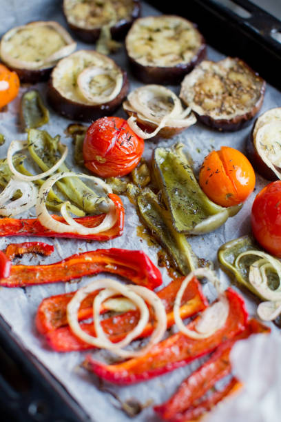 istock Tray with baked eggplant, tomatoes, onion and pepper 1210741474