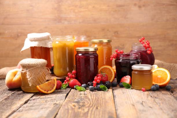 istock assorted of jam and jelly with fruits 1210741501