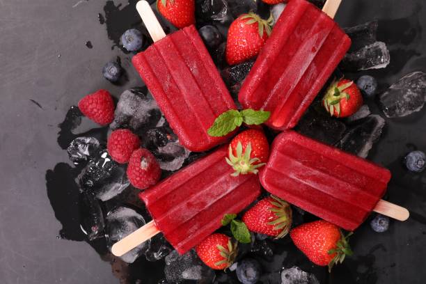 istock red ice cream popslices, strawberry sorbet 1210741505