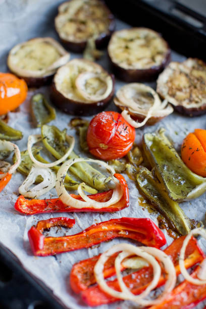 istock Tray with baked eggplant, tomatoes, onion and pepper 1210741569