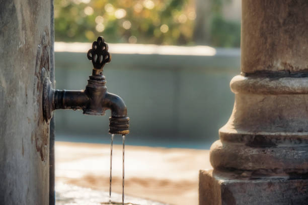 istock water drop on a historic and old fountain 1210742959