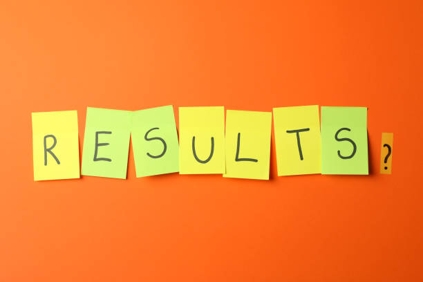 istock Inscription Results on orange background, space for text 1210747638