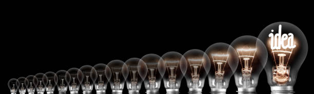 istock Dark and Shining Light Bulbs with Idea Concept 1210752250