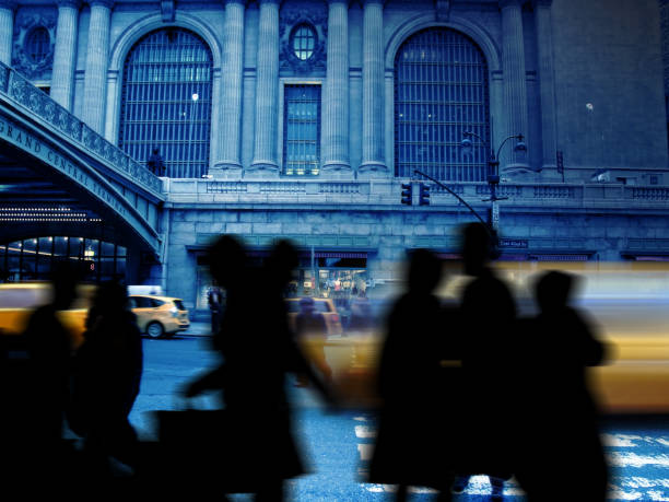 istock busy Manhattan street with moving traffic 1210754876