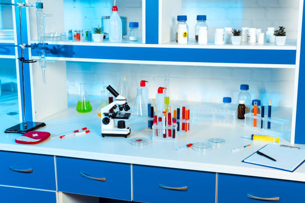istock flasks, test tubes and bottles near microscope in modern laboratory 1210755081
