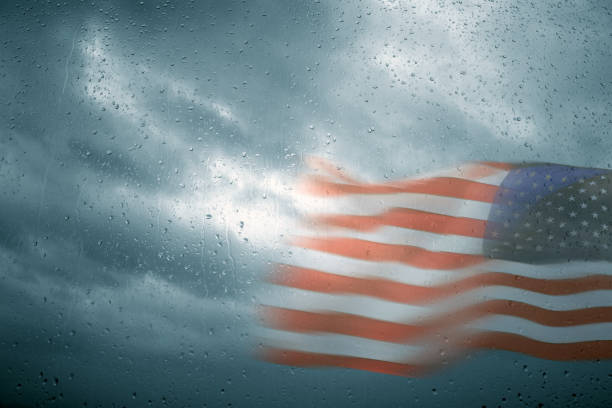 istock American flag in rainy day 1210755202