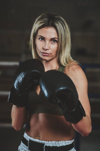 istock Portrait of experienced female boxer 1210756458