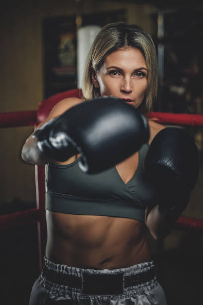 istock Portrait of experienced female boxer 1210756840
