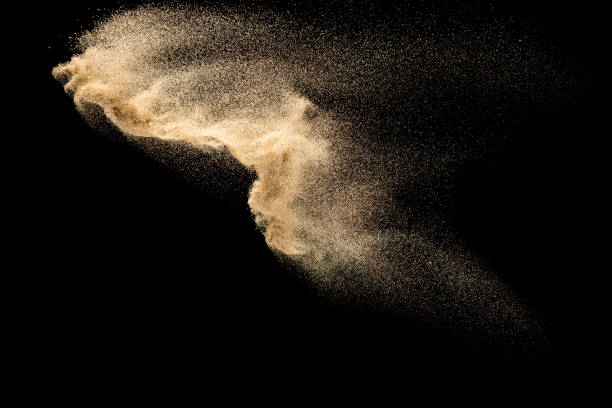 istock Dry river sand explosion.Brown color sand splash against black background. 1210762617