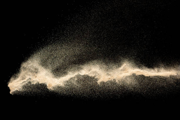 istock Dry river sand explosion.Brown color sand splash against black background. 1210762634