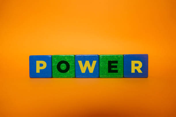 istock POWER, Wood Blocks on Orange Background. 1210763086