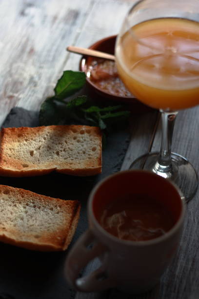 Typical Spanish breakfast, with Iberian ham toast, orange juice and coffee with milk