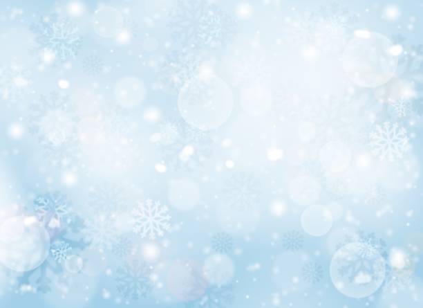 istock Blue abstract background. white bokeh snowflakes stars blurred beautiful shiny lights use wallpaper backdrop Christmas wedding card and texture your product. 1210768183
