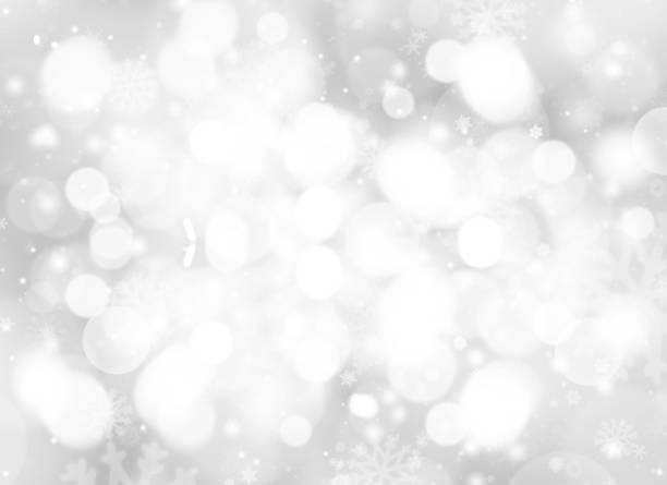 istock Gray abstract background. white bokeh stars blurred beautiful shiny lights use wallpaper backdrop Christmas wedding card and texture your product. 1210768383