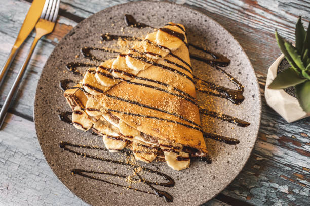 istock Fresh pancake with chocolate and bananas 1210769757