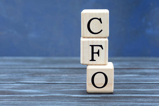 istock concept word CFO on cubes on a beautiful gray blue background 1210769829