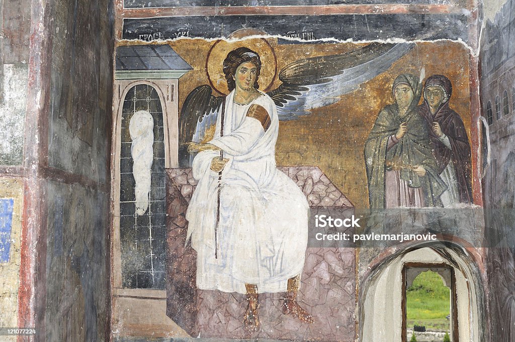 White Angel or Myrrhbearers on Christ's Grave White Angel or Myrrhbearers on Christ's Grave is world famous fresco from the Mileseva monastery circa 1230 AD in Serbia, it depicts an angel sitting in front of the tomb of Christ Angel Stock Photo