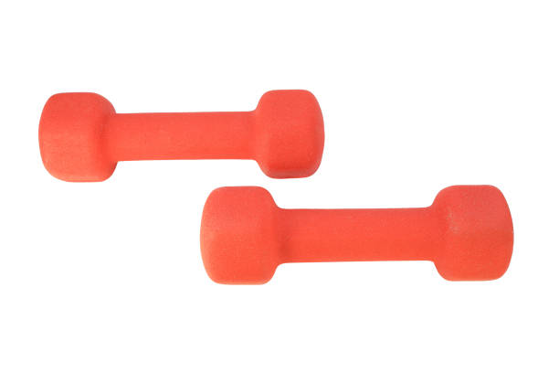 istock Two red fitness dumbbells with soft neoprene coating isolated on white background 1210772467