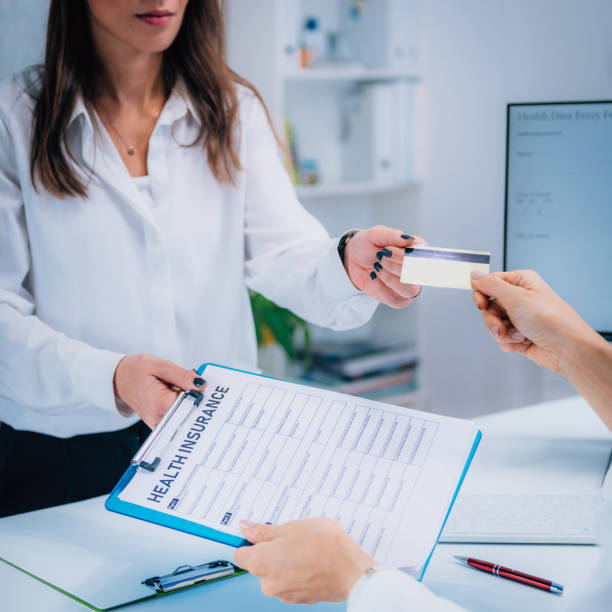 istock Paying Health Insurance with Credit Card 1210772514