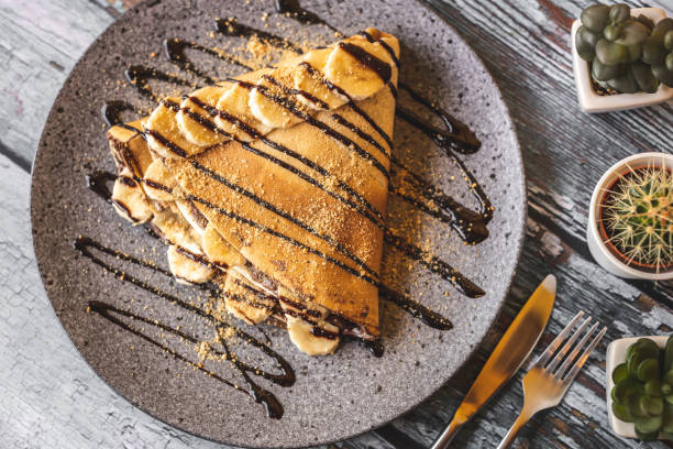 istock Delicious pancake with chocolate and bananas 1210773576