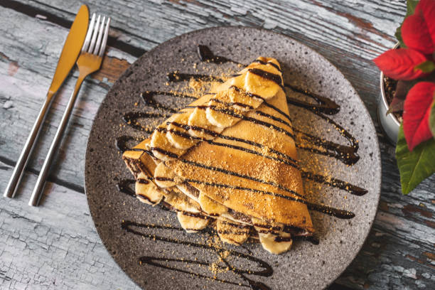 istock French pancake with chocolate and bananas 1210773695