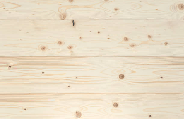 Close-up of a polished spruce board. Close-up of a polished spruce board. Full frame background, photographed from above. You can use it for graphic design, pin board or furniture surface. spruce stock pictures, royalty-free photos & images