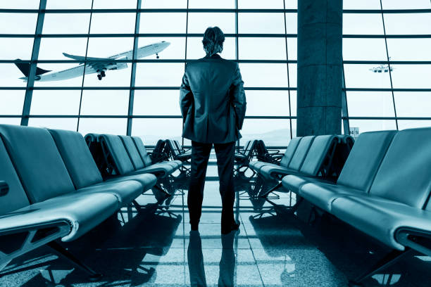 istock Businessman Waiting for Flight in Airport Lounge 1210781049