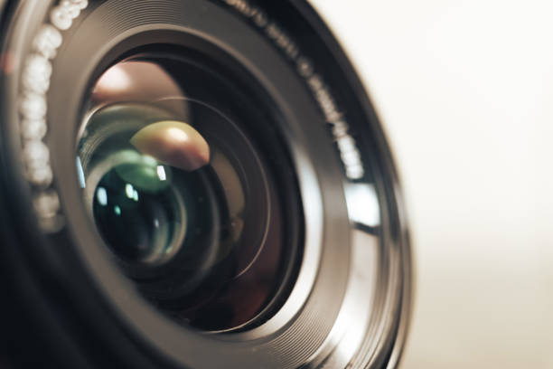 istock Close up beautiful camera lens on a gray background. 1210781602