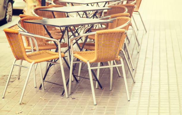 istock Street cafe tables and chairs. Selective focus. 1210785645